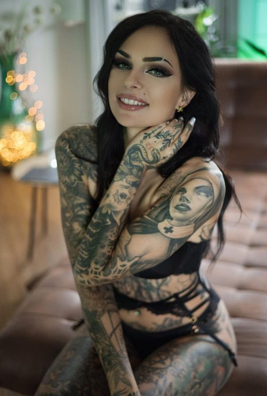 captivating body artistry 33 mesmerizing photos of tattoo model kitten showcasing her original and artistic body ink 41645 19